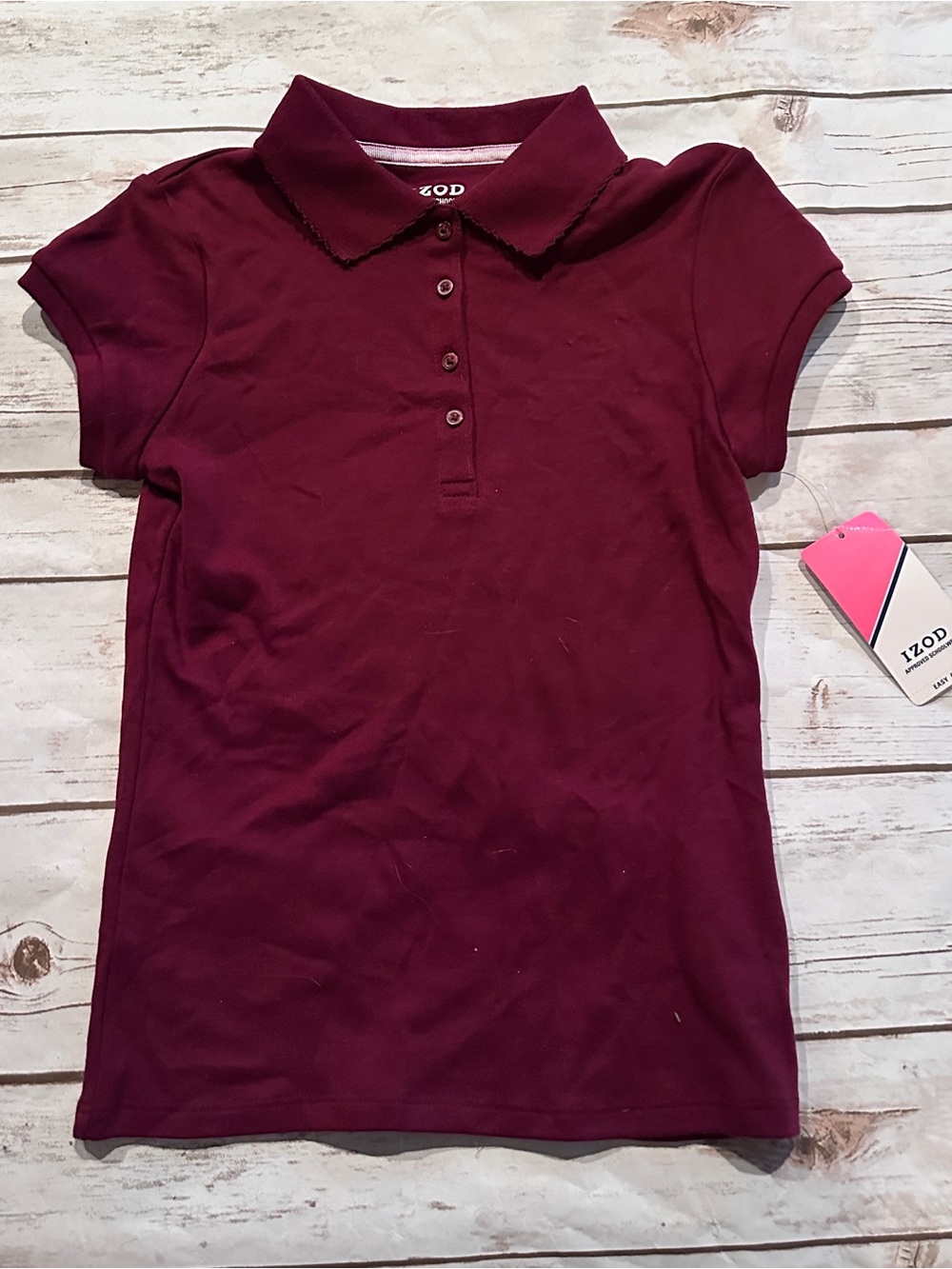 Izod Burgundy Polo Shirt nwt
Size S/P (7/8)